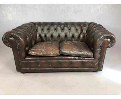 Chesterfield sofa, brown leather button back on castors, as found, approx 160cm wide