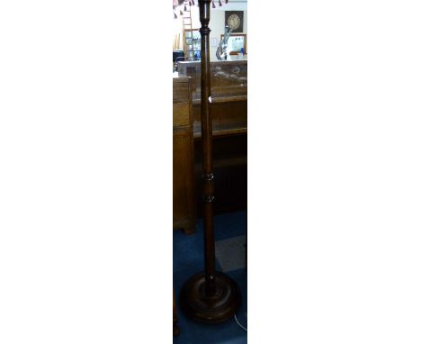  A Turned Oak Standard Lamp and Shade 