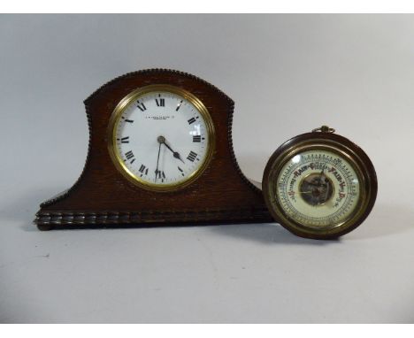 An Edwardian Oak Cased Mantle Clock and A Wall Hanging Aneroid Barometer 
