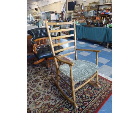 A Ladder Back Rocking Chair