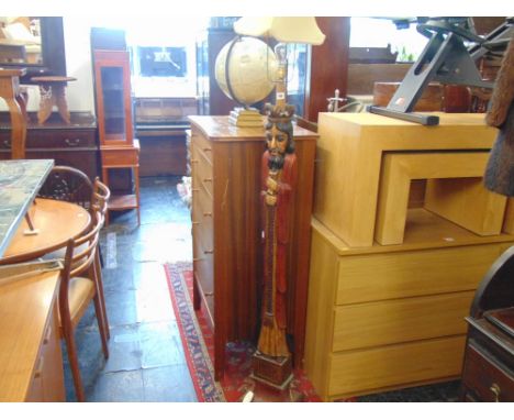 A carved wooden lamp, King