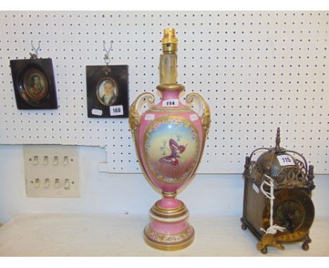 A porcelain table lamp, pink and gold, hand painted with butterflies