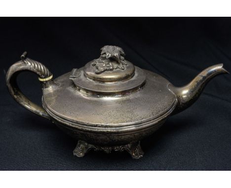 A William IV sterling silver teapot of squat spherical form, with cast floral finial, C scroll handle with acanthus leaf thum