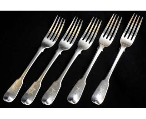 A good quality set of five George III sterling silver fiddle pattern dinner forks, each with period engraved crest to the fin