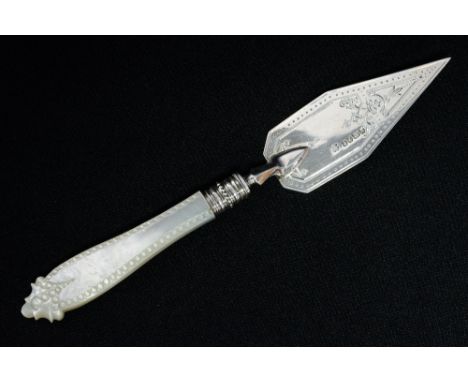 A Victorian sterling silver butter trowel with mother of pearl handle and chased decoration to front side of blade, full hall