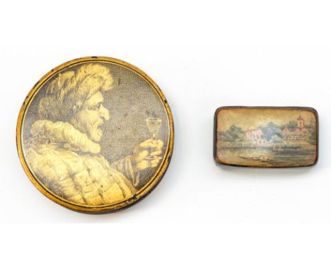 A 19th Century Russian circular snuff box with Punch type figure holding a wine glass and a transfer printed box, rowing on t