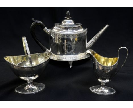 A superior George III sterling silver four piece tea service, comprising teapot of ovoid form, with matching stand, helmet sh