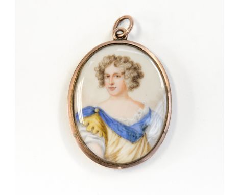 An oval portrait miniature mourning pendant, mid 19th Century, painted with a lady wearing a dress with a blue collar, on ivo