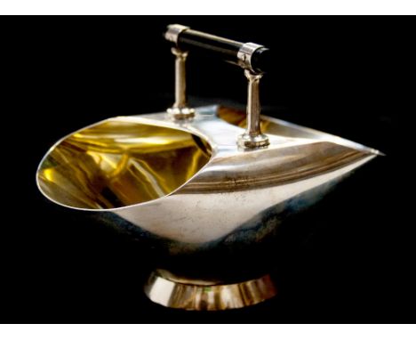 Christopher Dresser for Hukin and Heath, a silver sugar basin, folded coal scuttle form with ebony handle, gilt interior, Jon