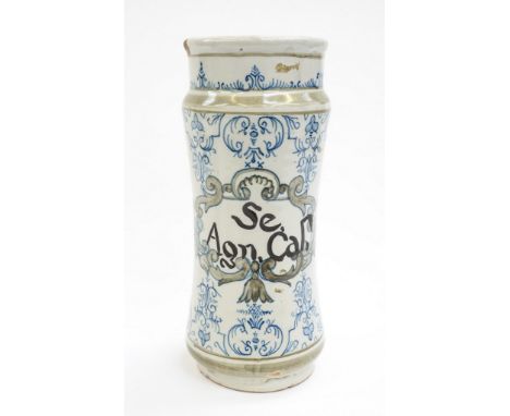 An Italian maiolica pharmacy jar or albarello, 17th century or later, blue scroll decoration on white ground with grey foliat