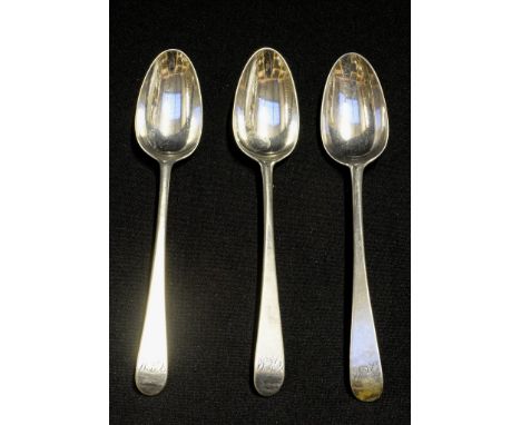 A set of three George III sterling silver old English pattern dessert spoons, each finial engraved with period script initial