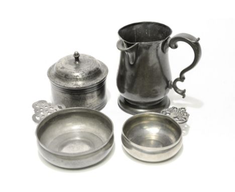 A collection of pewter including a quart jug, incised Rose Hill Tavern to the underside, two porringers and a tobacco jar wit