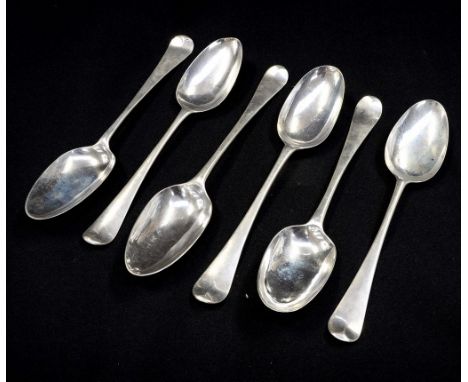 Six mid-eighteenth century sterling silver Hanoverian shell back tablespoons, different dates and makers, each finial adorned