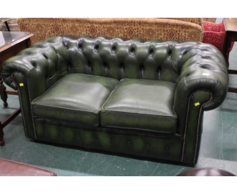 Green leather Chesterfield two seater sofa, height 70 cm, width 155 cm, depth 85 cm