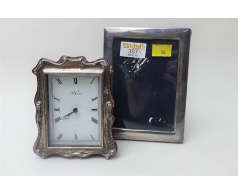 Silver framed mantel clock and photo frame