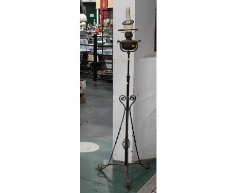 Brass oil lamp on metal stand, height 180 cm 