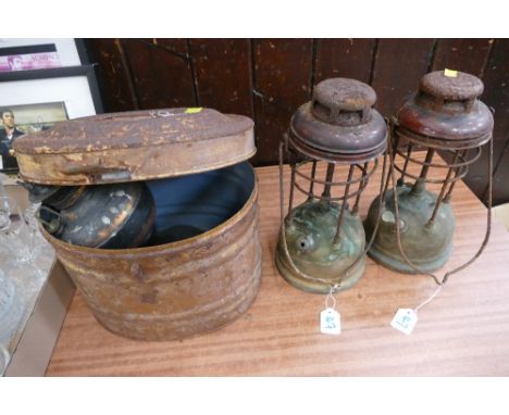 Hat tin, 2 storm lamps and oil lamp base 