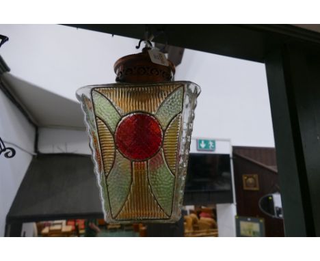 Ceiling light fitting with coloured glass shade