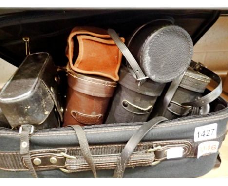 Case of camera's and binoculars, including Zenit and a tripod. Not available for in-house P&amp;P 