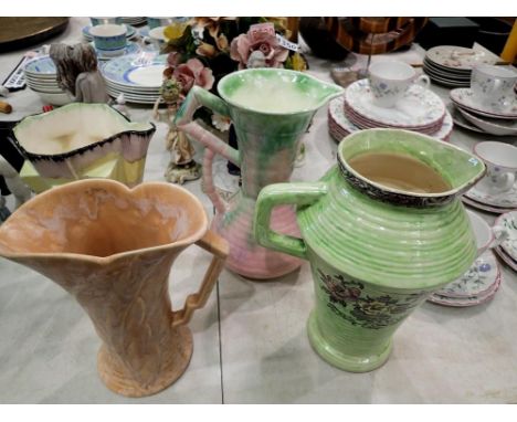 Four mixed ceramic large jugs. Not available for in-house P&amp;P 