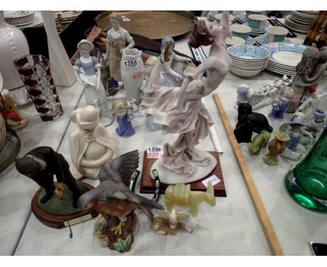 Mixed collection of resin and ceramic figures, including a dancer on a wooden plinth and a golfer on a plinth etc. Not availa