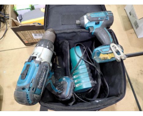 Two drills and a charger. Large container full of stud wall off cuts for projectors or firewood. All electrical items in this