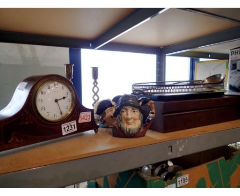 Mixed collection of items to include a small inlaid mantel clock, brass candlesticks, silver plated canteen of cutlery etc. N