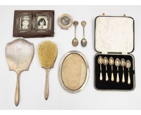 *Item to be collected from Friargate, Derby* A George V silver backed dressing table brush and mirror, engine turned design, 