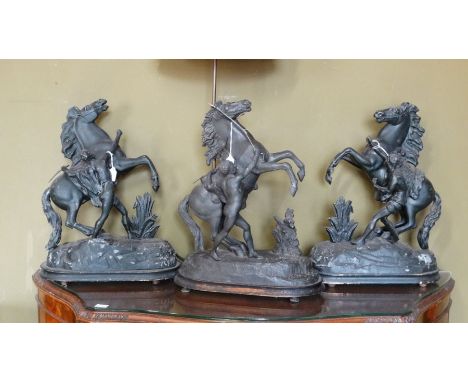 *Item to be collected from Friargate, Derby* A pair of late 19th century spelter models of horses and men, approx 43cm high; 