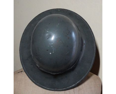 *Item to be collected from Friargate, Derby*A World War II helmet, dated 1941, size 7, imprinted marks 641M Condition - wear 