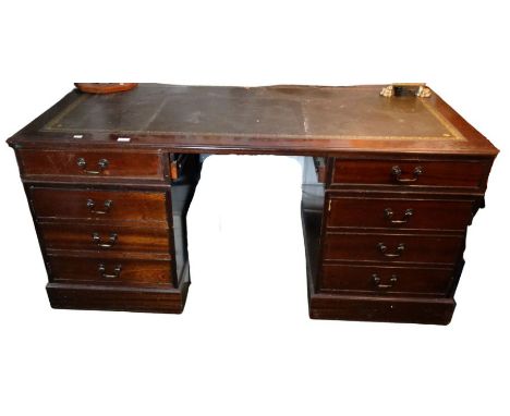 *Item to be collected from Friargate, Derby*A 20th century mahogany twin pedestal desk, leather inset top above drawers and b