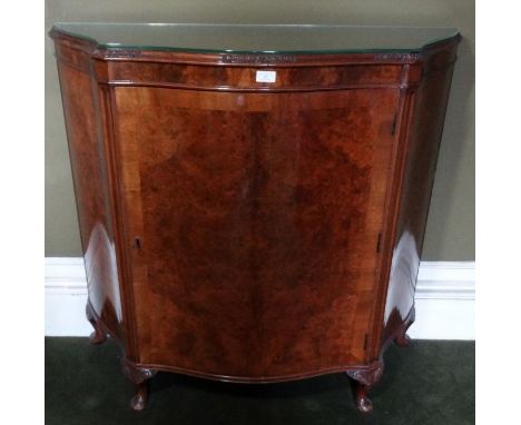 *Item to be collected from Friargate, Derby* A 20th Century walnut veneered serpentine front credenza, the shaped top with mo