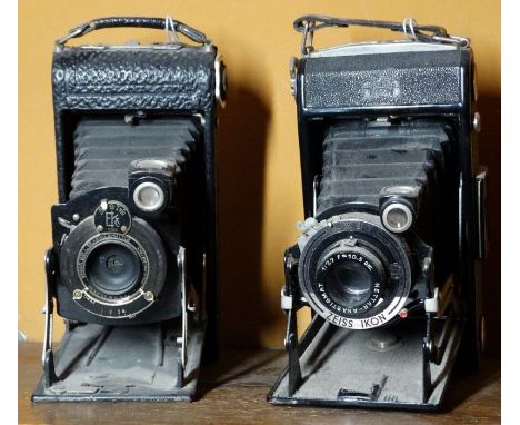 *Item to be collected from Friargate, Derby* A Zeiss Ikon folding camera; and another Kodak; together with an Ensign camera; 