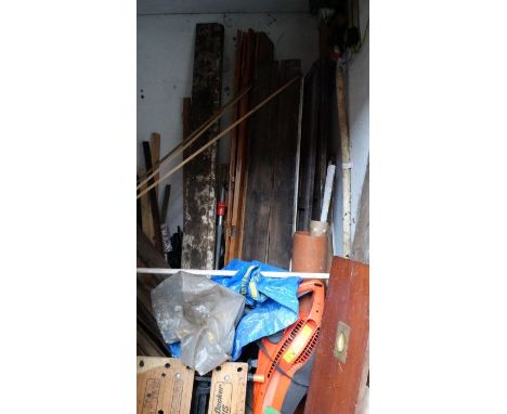 *Item to be collected from Friargate, Derby*Contents of the outhouse including pieces of wood; cast iron garden bench ends; o