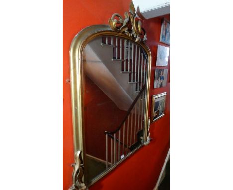 *Item to be collected from Friargate, Derby*A 19th century gilt gesso arch rectangular over mantle mirror, with foliate pedim