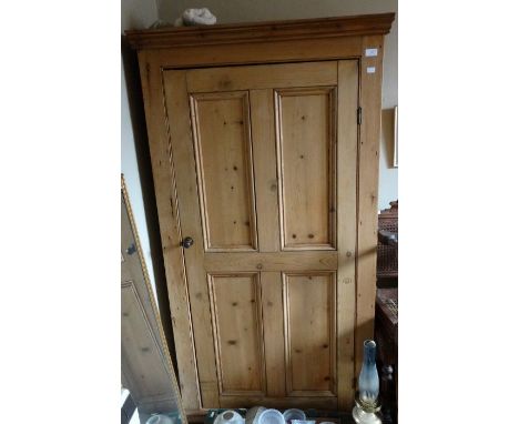 *Item to be collected from Friargate, Derby*A Victorian style pine wardrobe, single door opening to reveal hanging rails and 