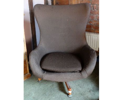 *Item to be collected from Friargate, Derby*A 1970s high back swivel armchair on four legs, approx 98cm high x 77cm wideCondi