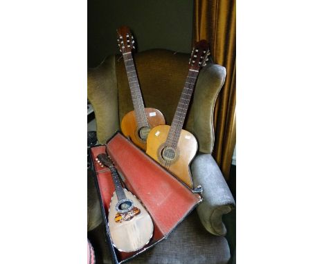 *Item to be collected from Friargate, Derby* A Raimundo acoustic guitar; a Dulcet acoustic guitar; and an Italian mandolin in