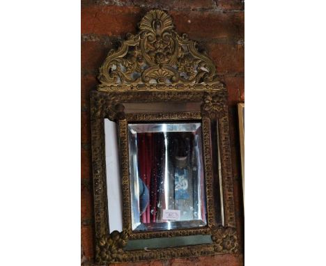 *Item to be collected from Friargate, Derby*A 19th century embossed brass wall mirror, bevelled glass, approx 58cm high x 32.