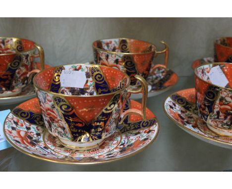 Early 19th Century Imari pattern part tea set comprising of twelve cups and saucers