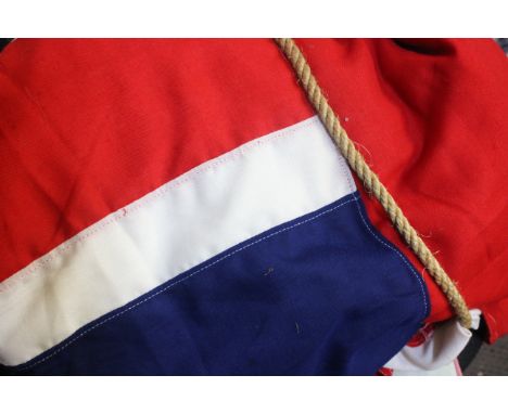 A Large British 20ft x 10ft Royal Navy White Battleship Ensign by Porter Brothers of Liverpool  dated 1987 of multi-part cons