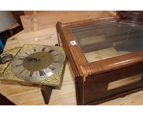 A 19th Century oak longcase clock 'R Roc Haslemere' with a silvered dial, and subsidary dial 214cm high, together with furthe