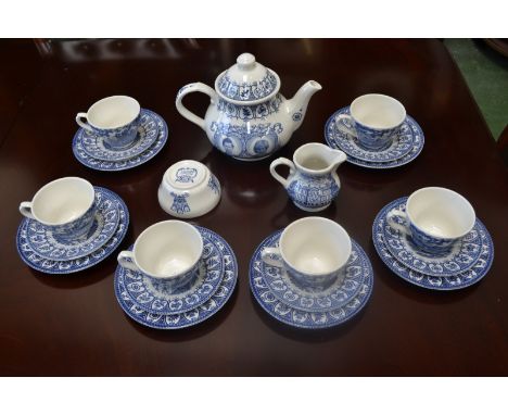 A blue and white commemorative tea service for four, transfer printed with his Royal Highness Prince of Wales and Lady Diana 