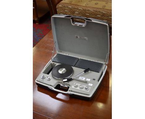 A Pye Cambridge portable record player.