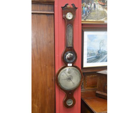 A George III mahogany banjo barometer, by William & Haydons of London, wavy broken pediment, silvered thermometer and registe