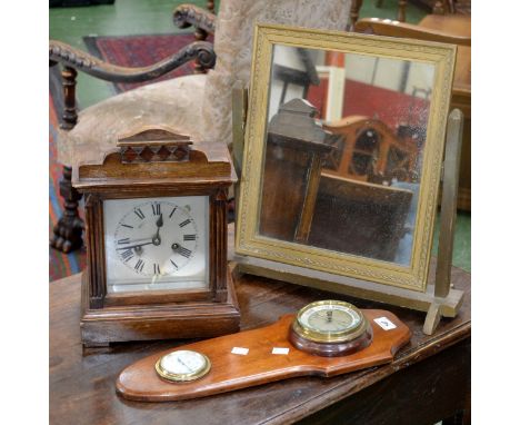 A 19th century chiming Mantel clock;  a propeller blade mounted barometer, thermometer;  a dressing table mirror (3)