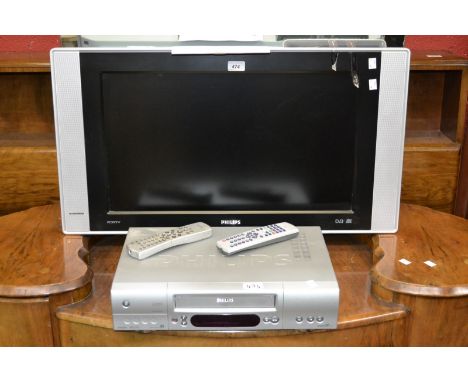 A silver Philip's flat screen TV; video recorder 