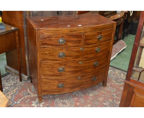 A Sheraton revival mahogany bow fronted chest of drawers, caddy top, satinwood inlay, two short over three long drawers. 90cm