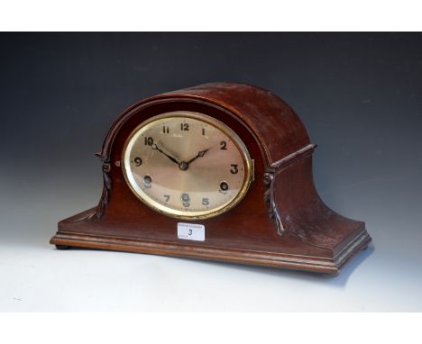 A Napoleon hat  mantel clock, trio of winding holes, scrolling columns, c.1920s 