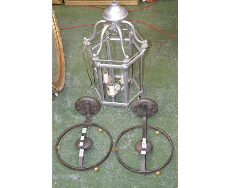 A contemporary hexagonal ceiling lantern; two cast iron wall lights (3)